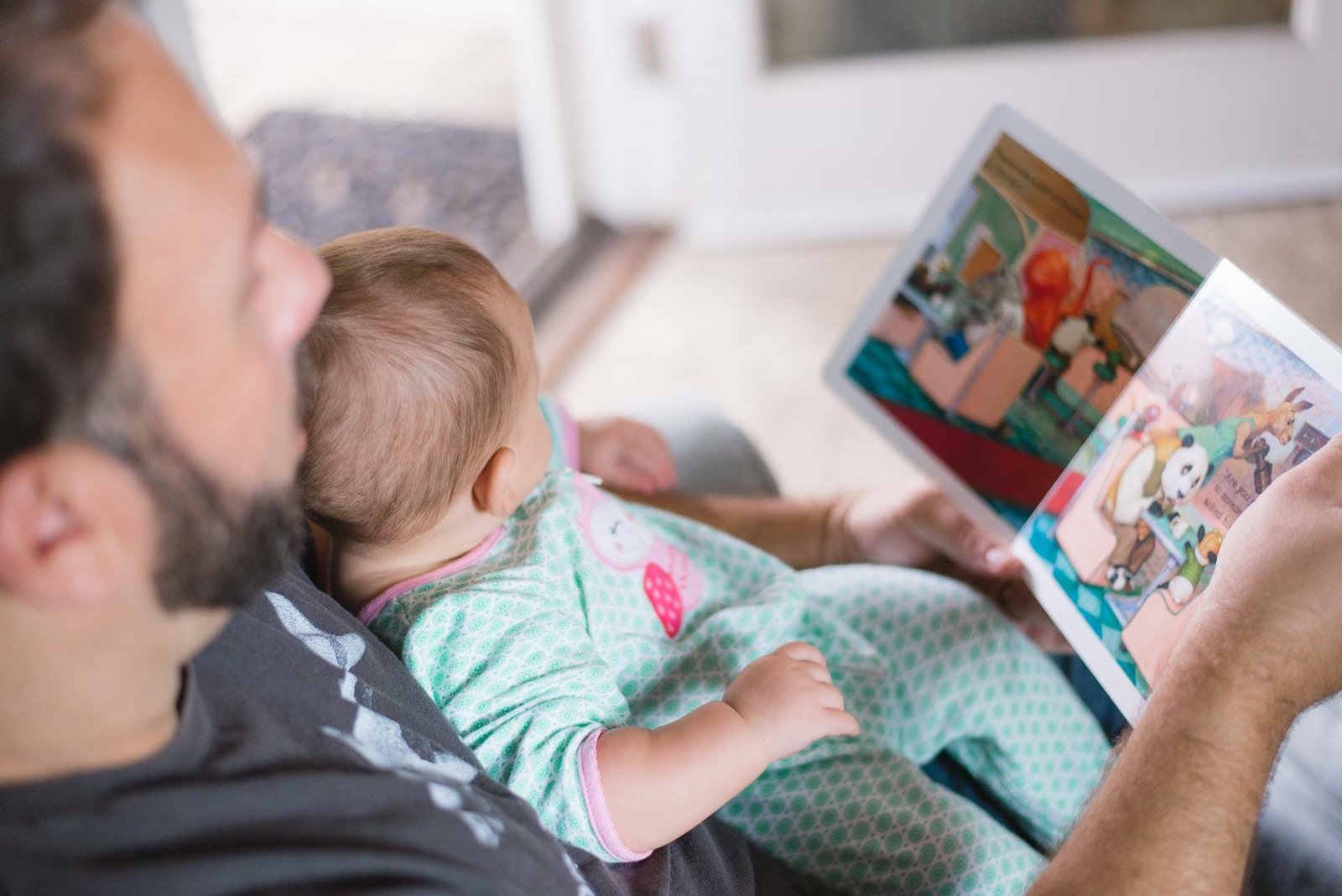 A child reading with parent