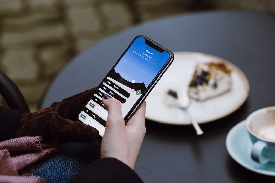 Person-using-a-phone-for-texting-service-for-nonprofits-and-sending-donations-via-text